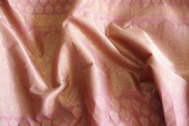 A light pinkish peach cotton Kanjeevaram - fit for the summer bride