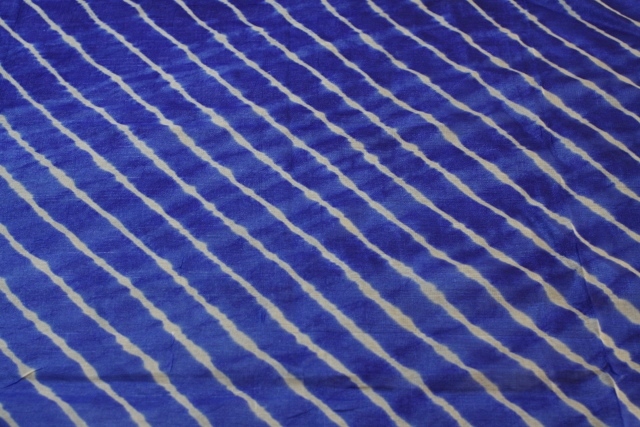 A royal blue Leheriya. Notice the irregular lines. Clearly an indication of a hand-made product.